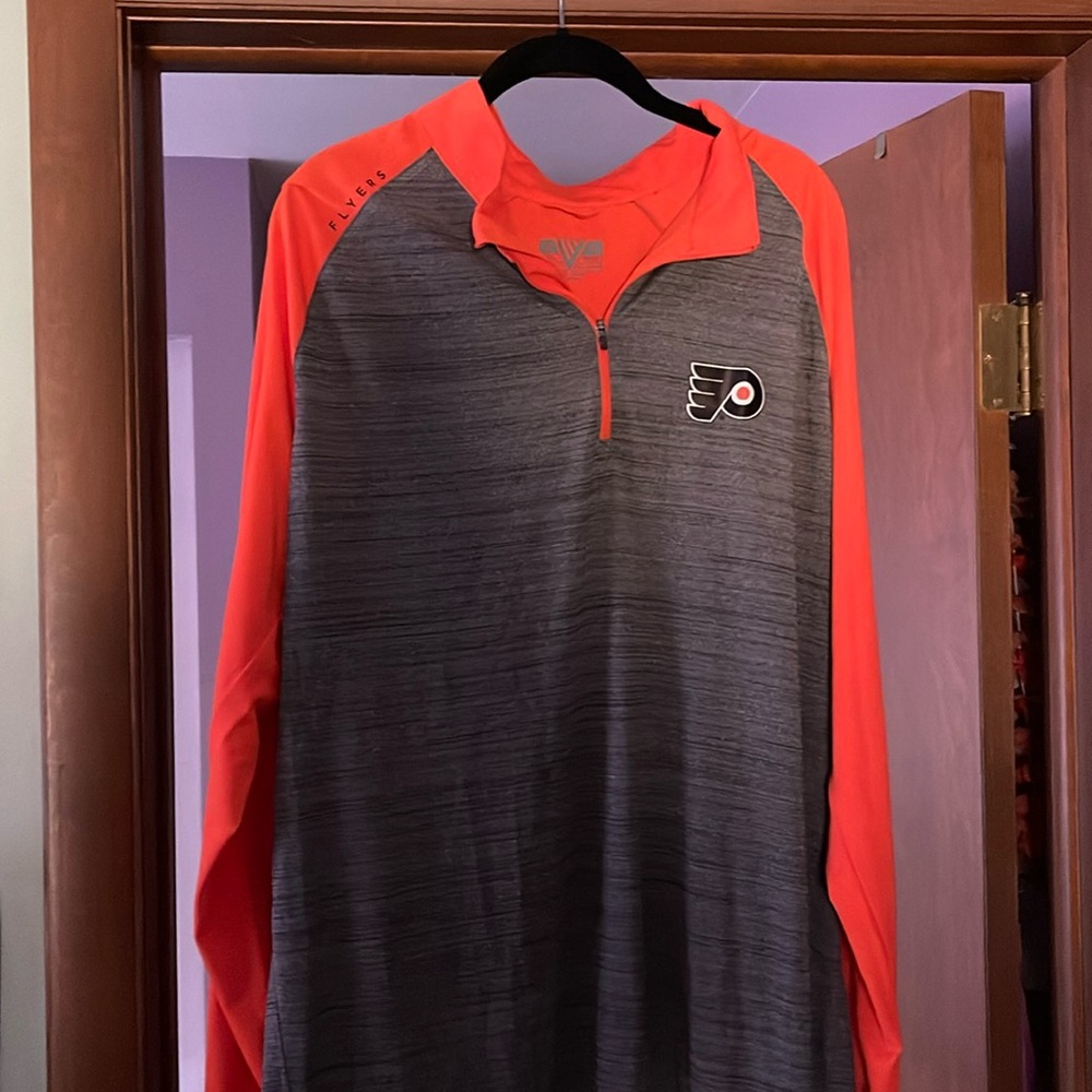 Men’s Philadelphia Flyers moisture wicking shirt. XL.  25 in armpit to armpit